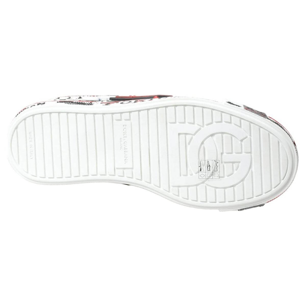Dolce & Gabbana sneaker sole with embossed logo and grip details; features multicolor hand-painted design on leather.