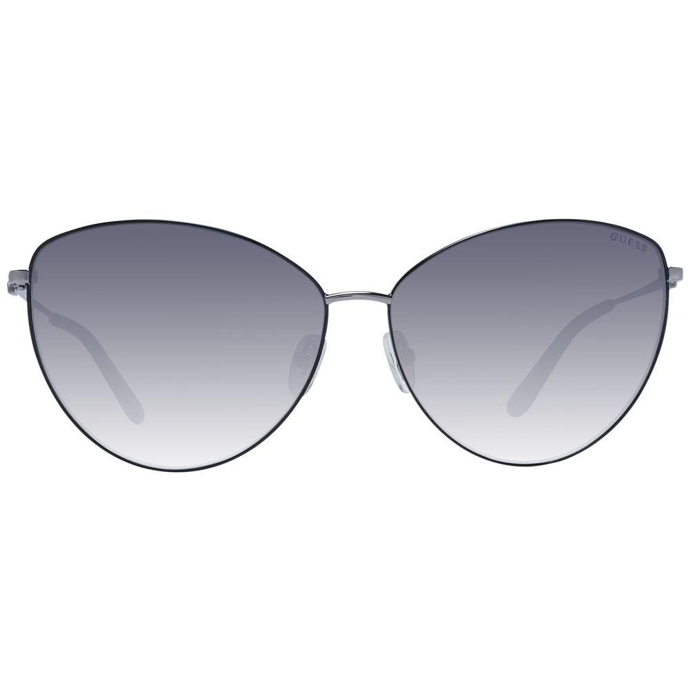 Guess women's gray cat eye sunglasses with gunmetal metal frame and gradient grey lenses offering 100% UVA & UVB protection.