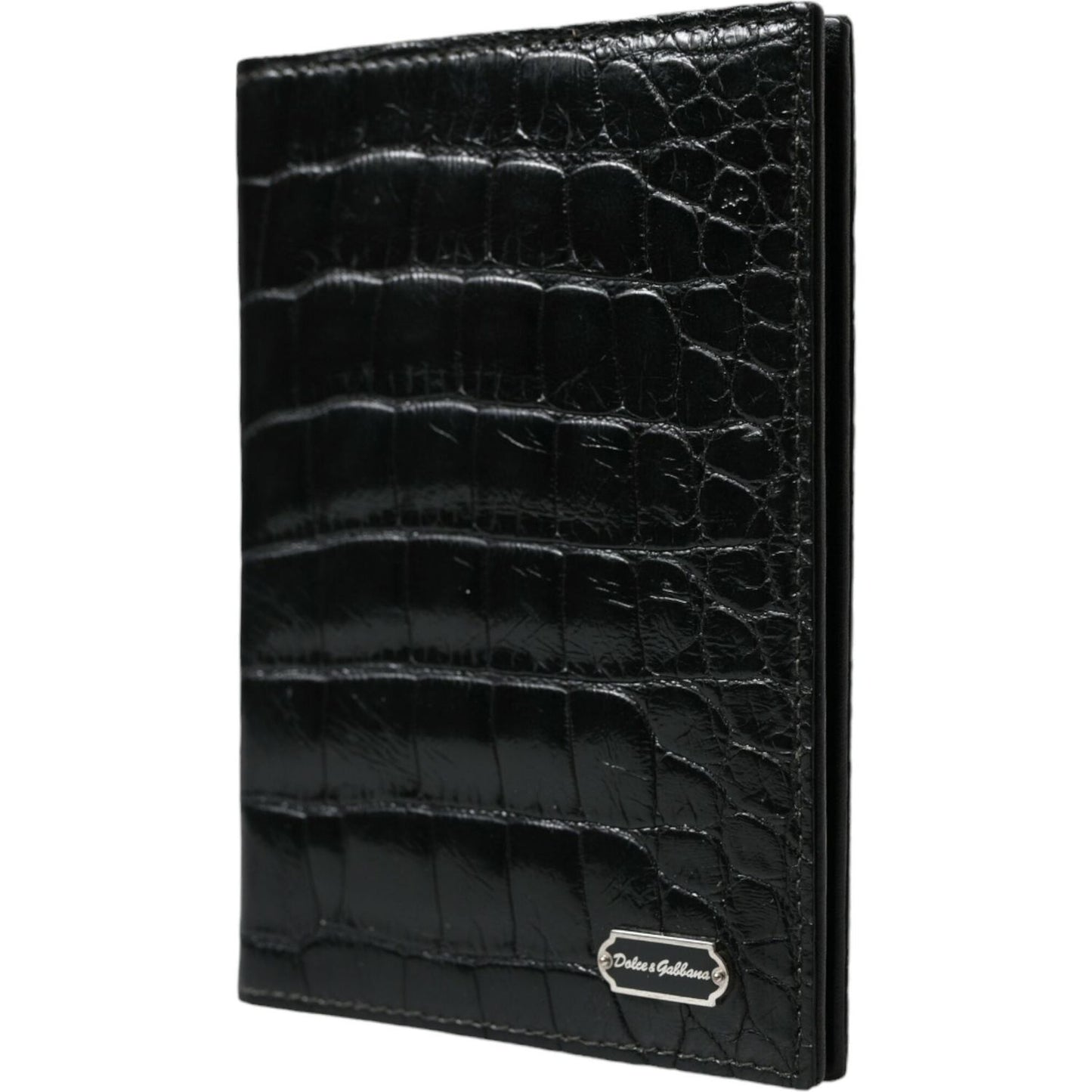 Dolce & Gabbana black crocodile leather bifold passport holder with logo plaque, made in Italy. Luxurious travel accessory.