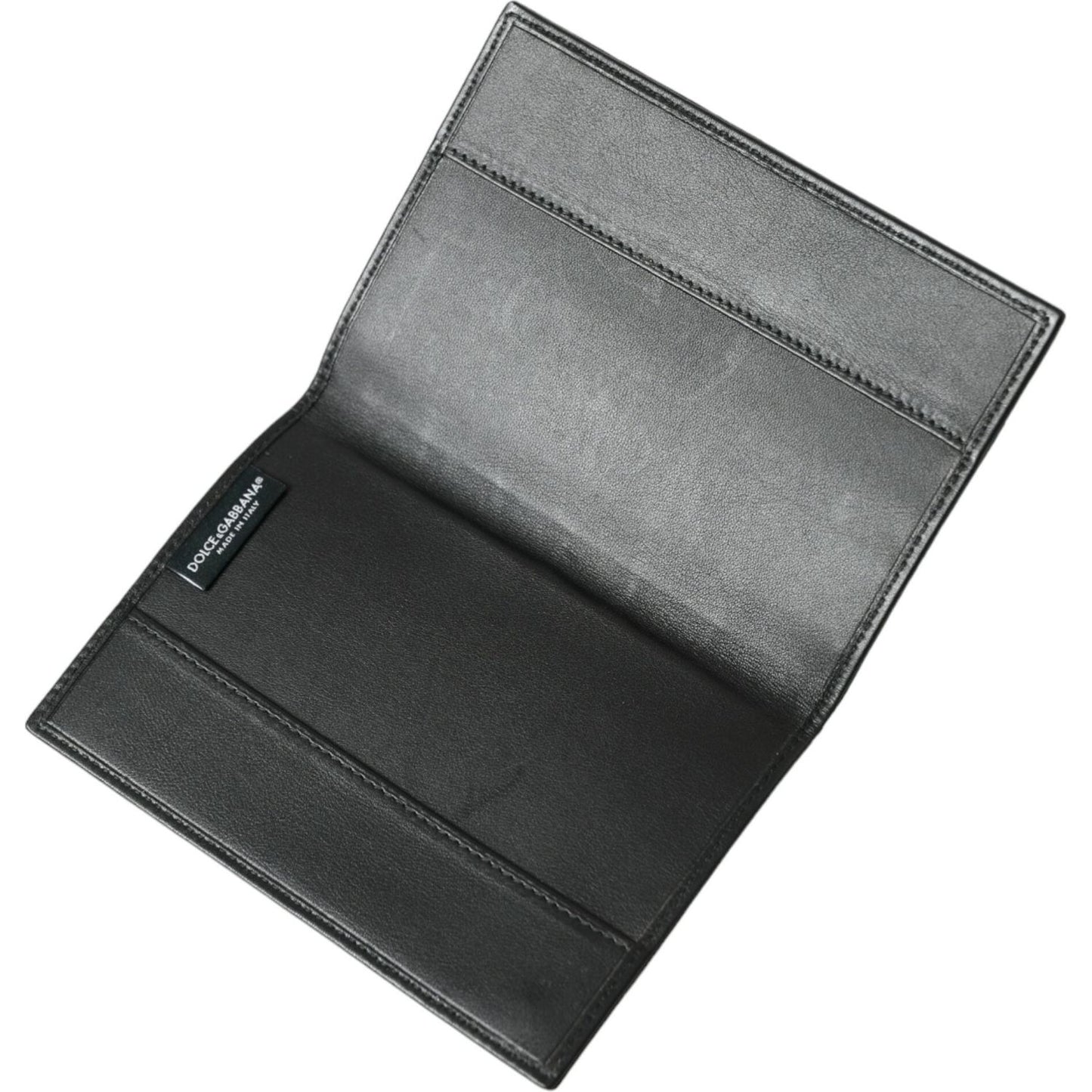Dolce & Gabbana black exotic leather bifold passport holder with logo plaque, 95% crocodile and 5% calf leather, made in Italy.