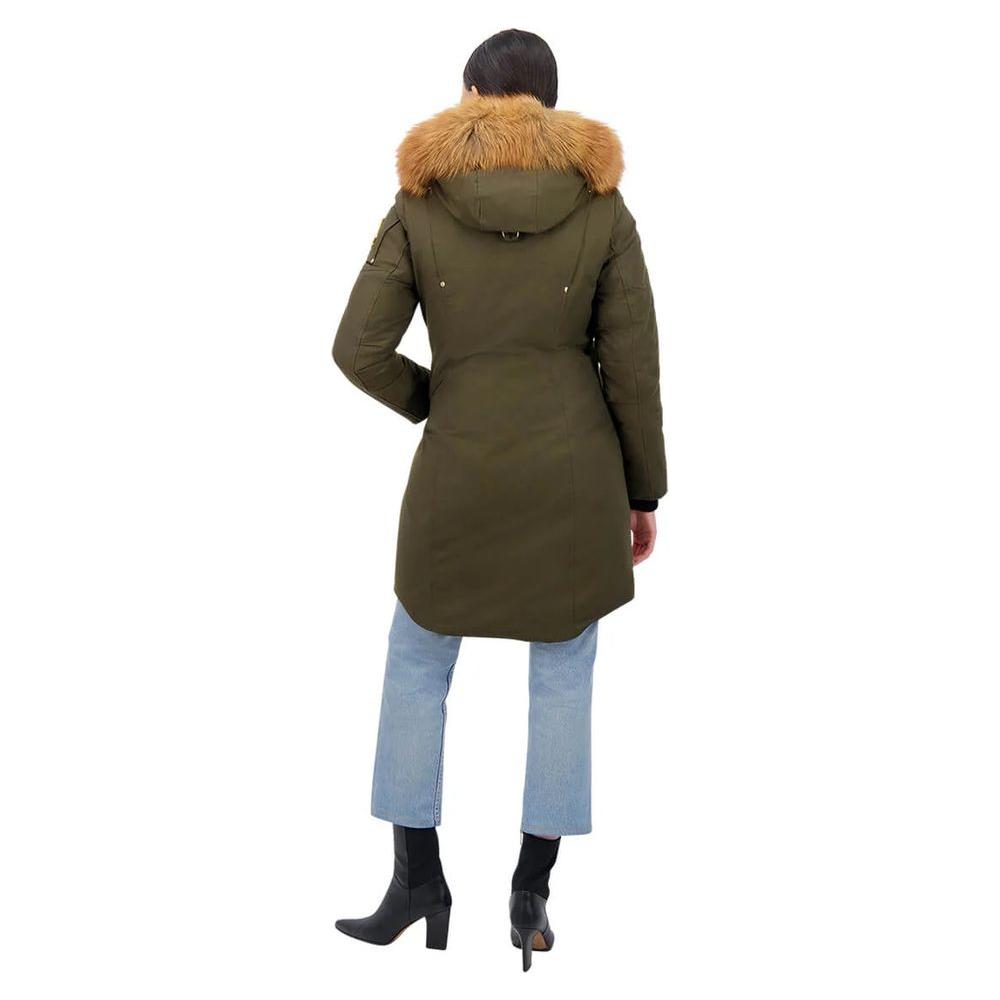Moose Knuckles Army Cotton Women Coat featuring detachable hood and gold-tone hardware, model wearing blue jeans and black boots