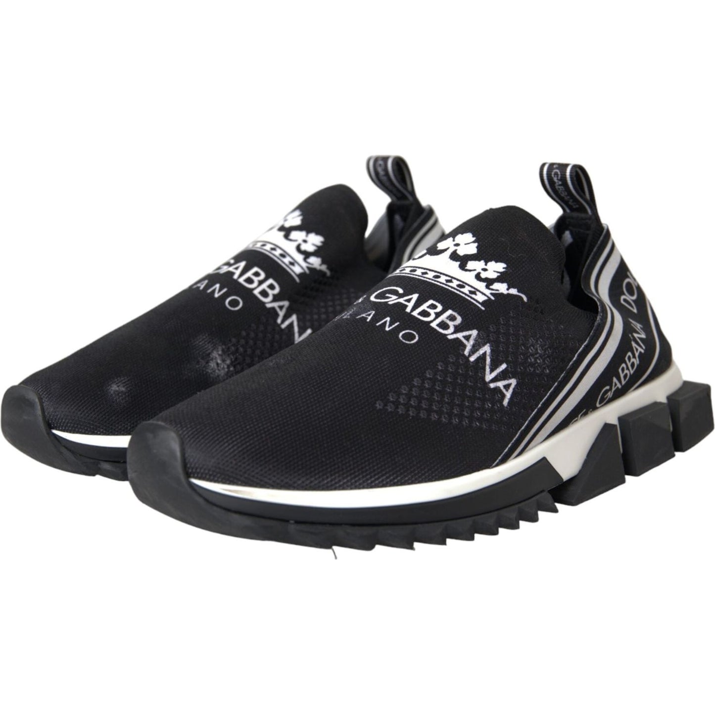 Dolce & Gabbana Sorrento slip-on sneakers in black and white with logo print and rubber sole, elegant and exclusive Italian design.