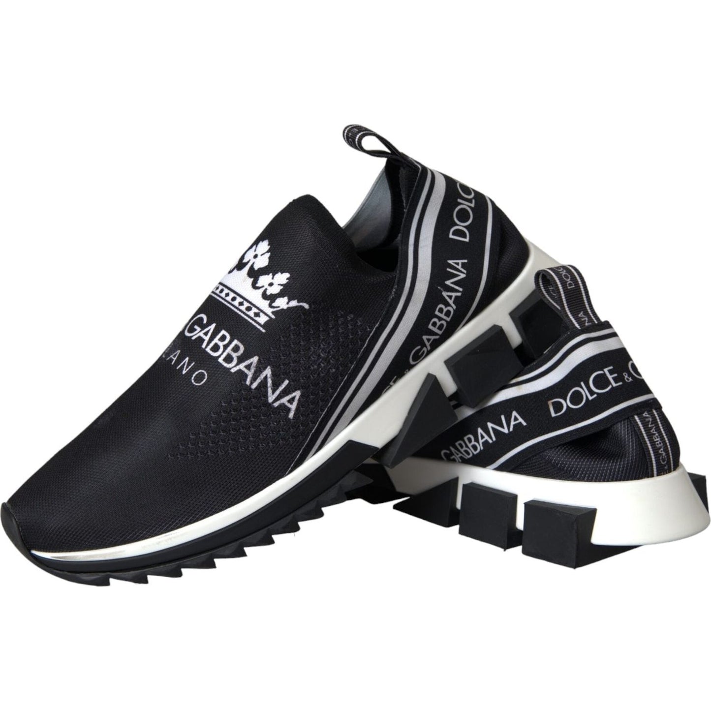 Dolce & Gabbana Sorrento slip-on sneakers in black and white with logo print and decorative rubber sole.