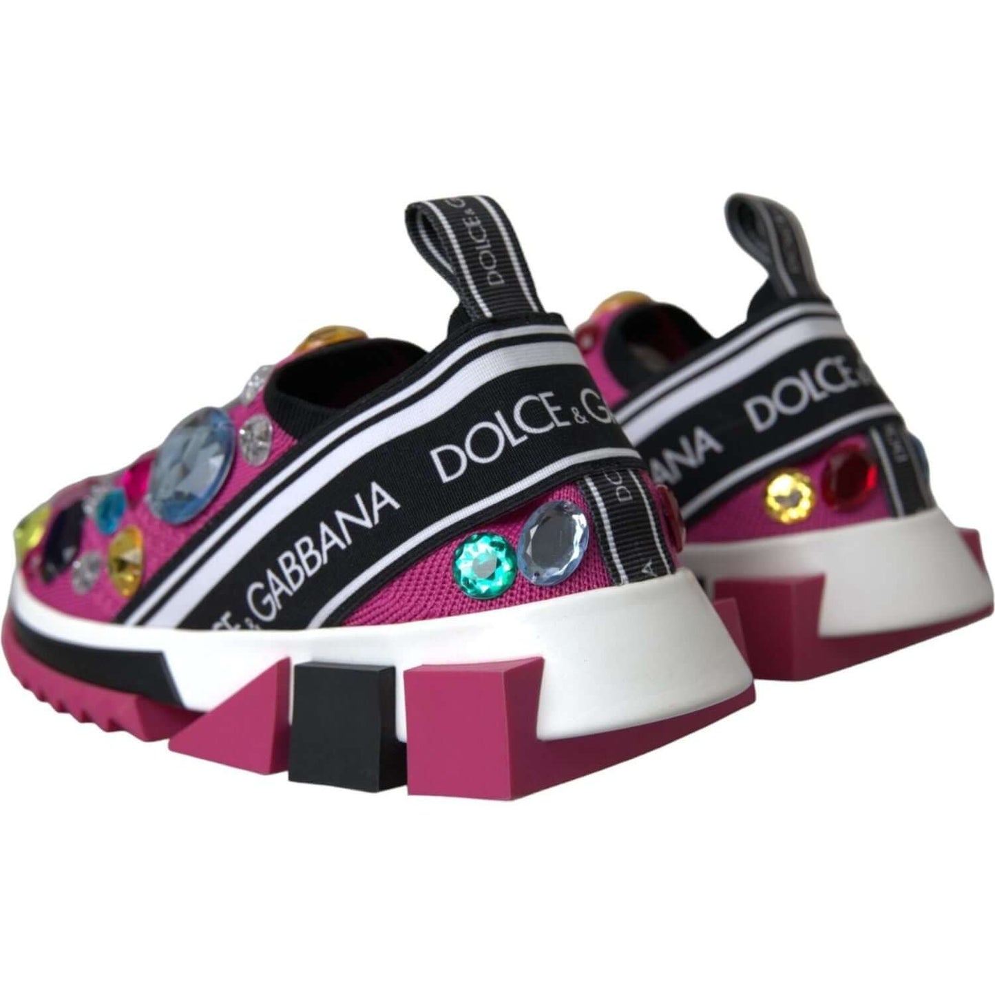 Rear view of Dolce & Gabbana pink Sorrento sneakers with rhinestones, featuring brand logo and rubber sole.