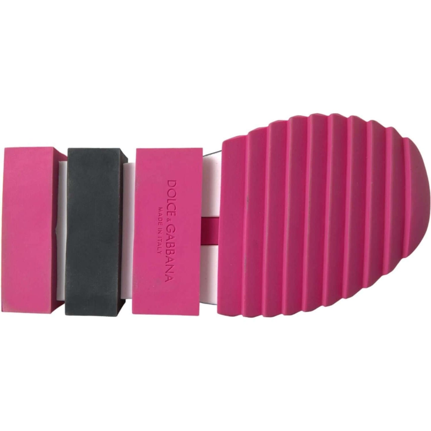 Close-up of the rubber cleated sole on Dolce & Gabbana pink Sorrento sneakers, showcasing quality and logo details.