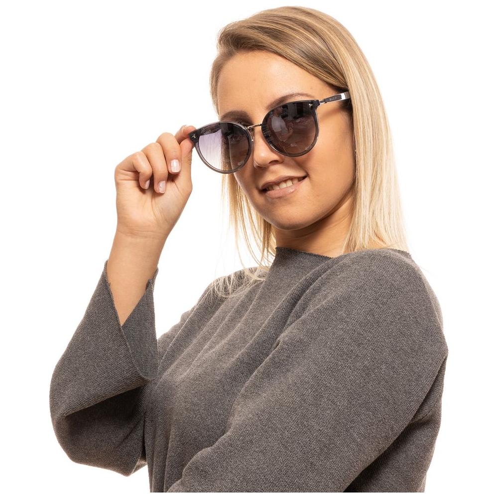 Woman wearing Bally Gray Round Sunglasses with grey mirrored lenses and full-rim frame, providing 100% UVA & UVB protection.