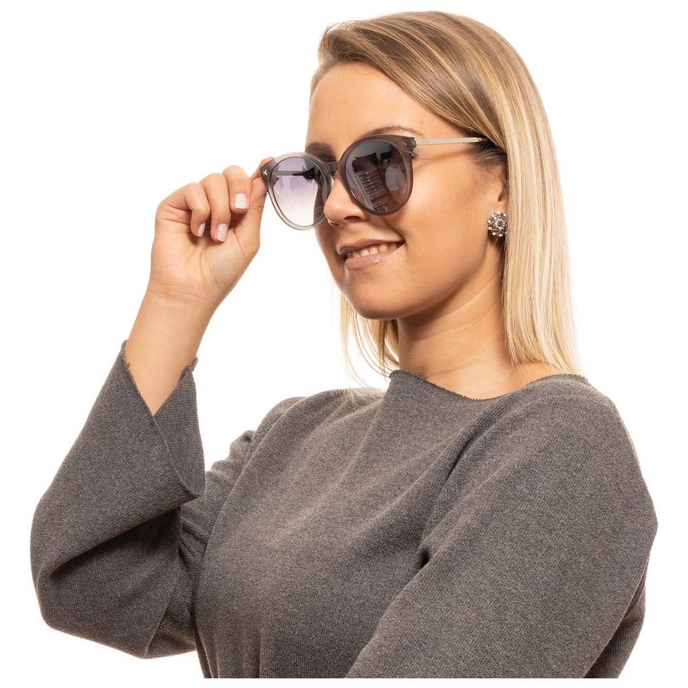 Woman wearing Bally Gray Cat Eye Sunglasses with mirrored gradient lenses and full-rim grey frame.