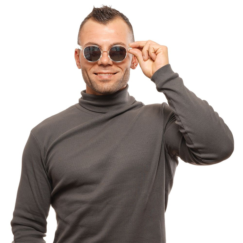 Man wearing Spy Transparent Unisex Sunglasses with grey mirrored lenses and plastic frame, smiling and adjusting eyewear.
