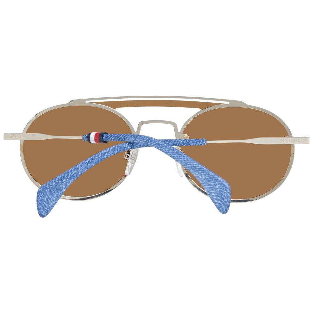 Tommy Hilfiger gold aviator sunglasses for women with brown lenses, metal and plastic frame, featuring full-rim style and UV protection.