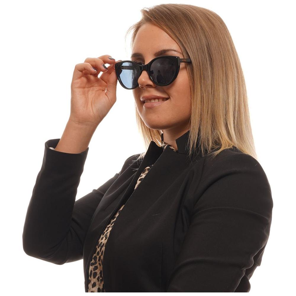 Woman wearing Ermenegildo Zegna black unisex sunglasses with polarized blue lenses, stylish full-rim design, providing 100% UVA & UVB protection.