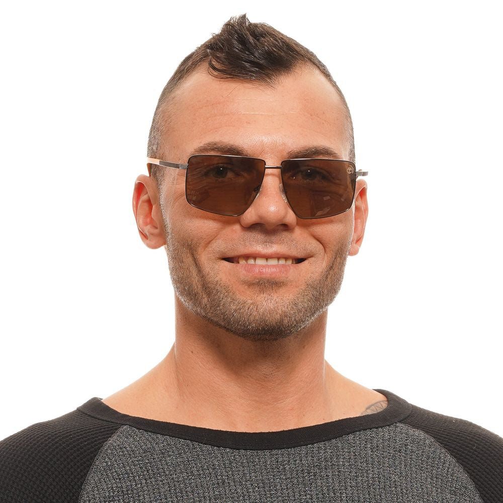Man wearing Timberland brown rectangle sunglasses with metal frame and polarized mirrored lenses.
