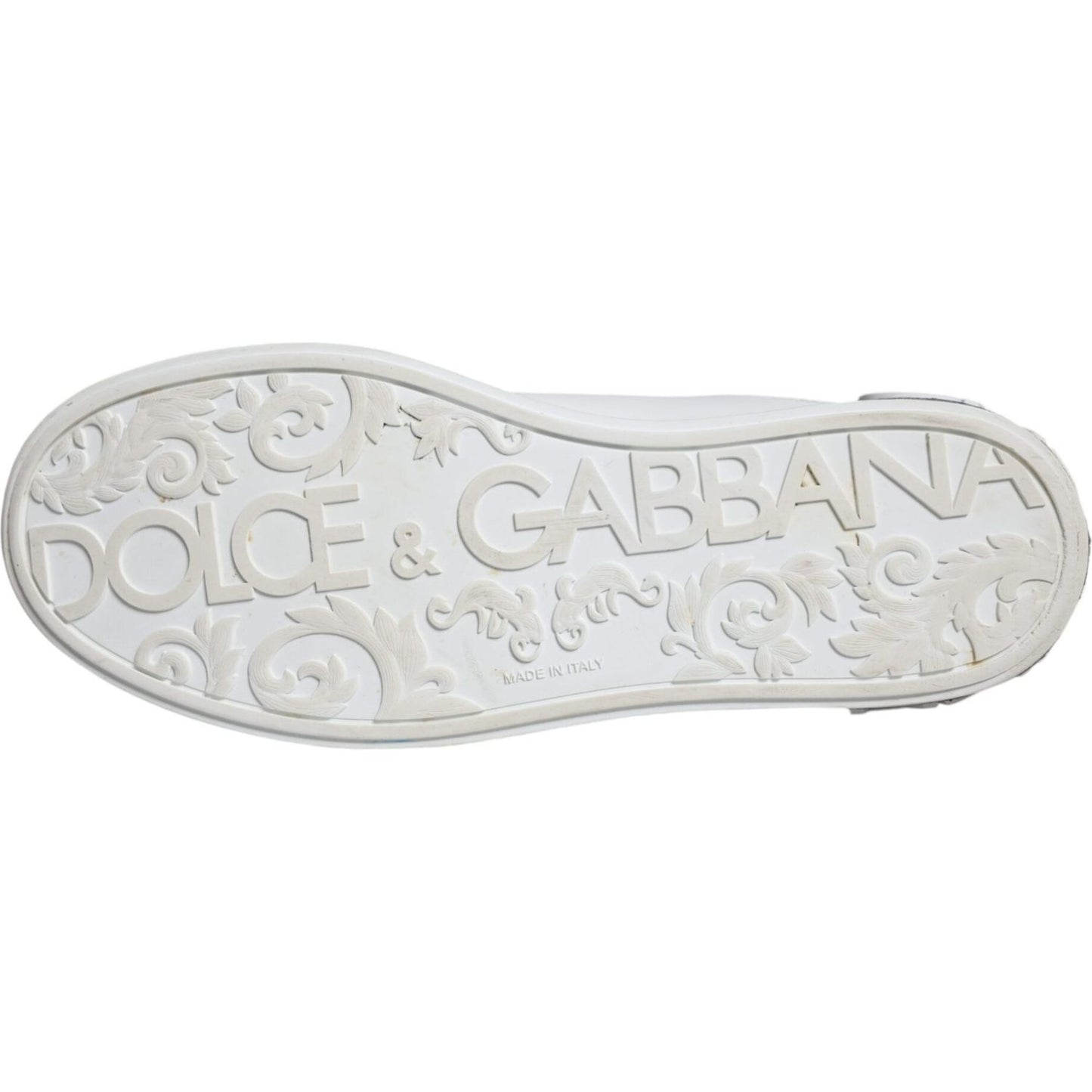 Bottom sole of Dolce & Gabbana Portofino white sneaker with embossed logo and floral design, made in Italy.