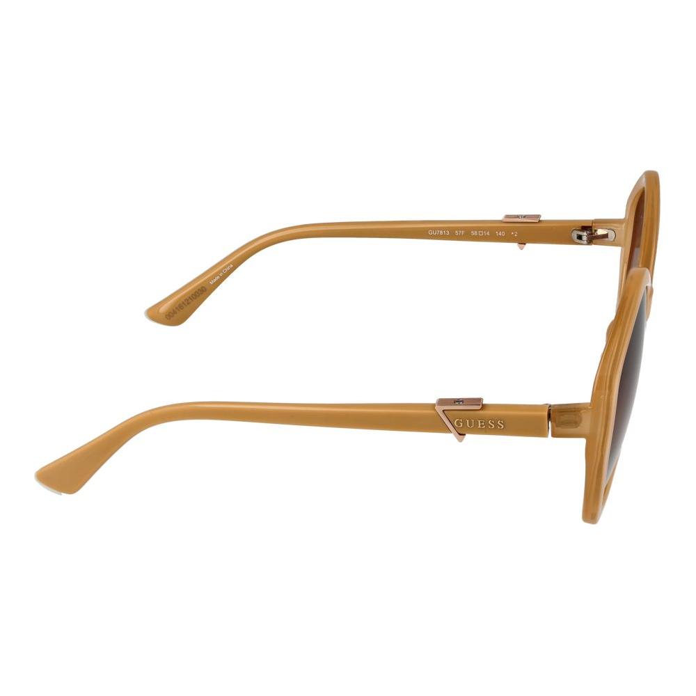 Side view of Guess brown women's sunglasses with full-rim plastic frame and gradient lenses