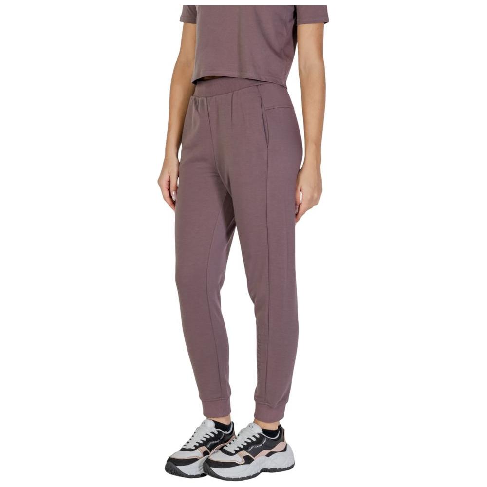 Calvin Klein Sport Purple Joggers made from Recycled Polyester, featuring sleek design and logo, ideal for fitness and leisure.