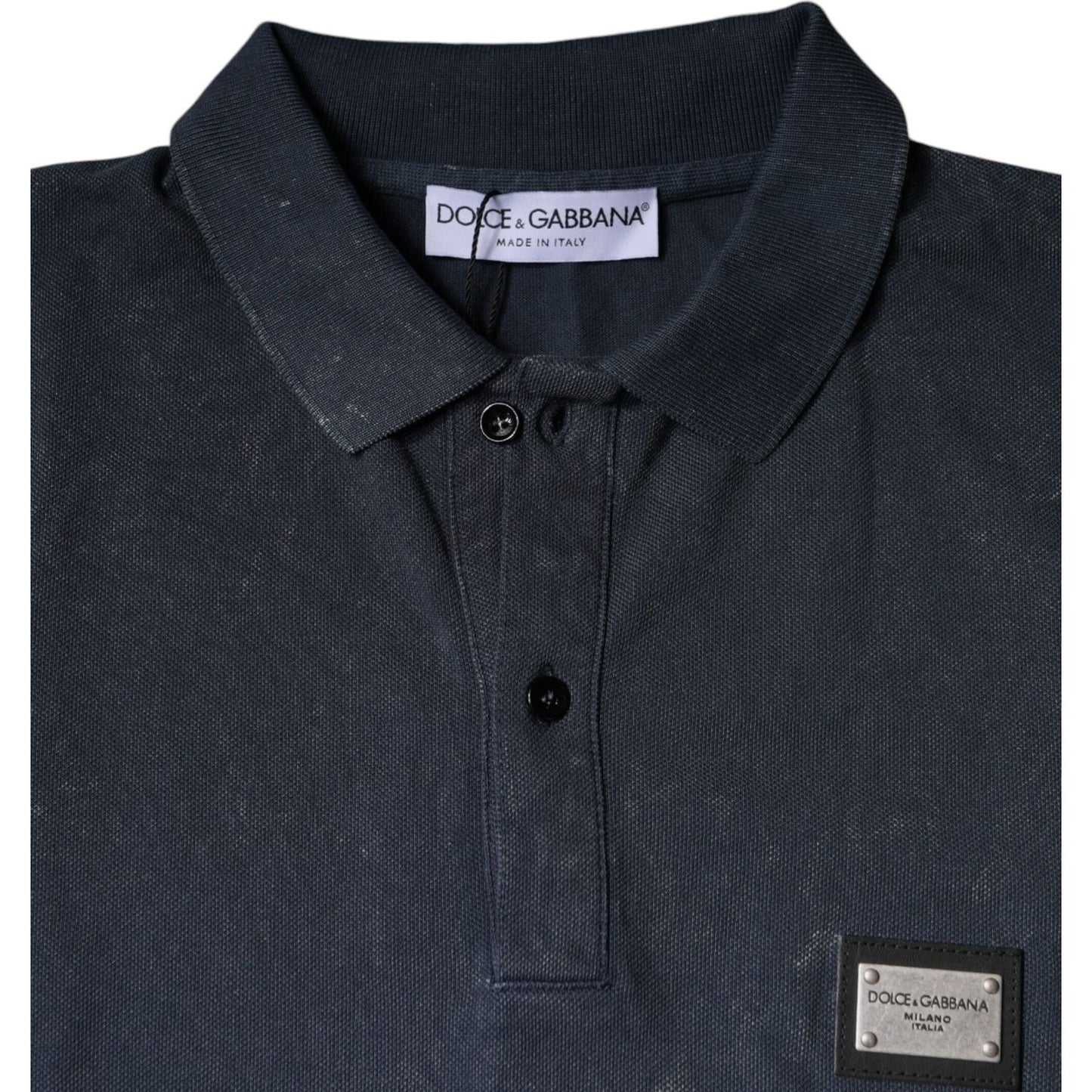 Dolce & Gabbana dark blue collared polo T-shirt with logo and button closure, featuring minor repaired holes on the back.