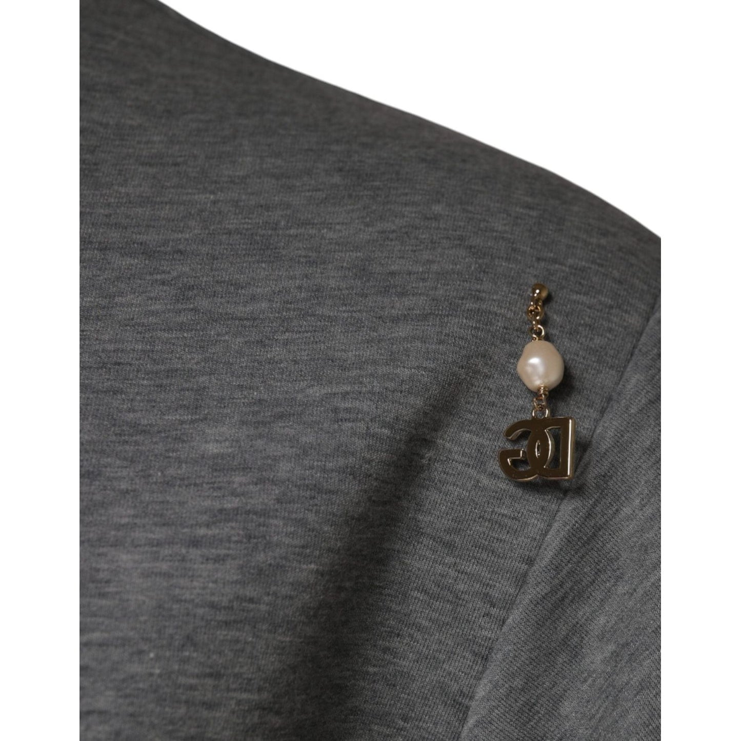 Dolce & Gabbana gray cotton blend embellished tee detail with logo charm and pearl on shoulder.