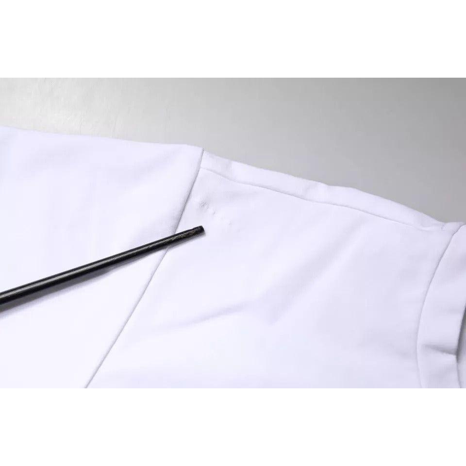 Close-up of defect on Dolce & Gabbana white T-shirt with pulled threads, showing minor flaw. Cotton blend fabric.