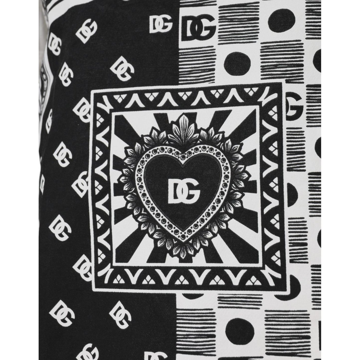 Close-up of Dolce & Gabbana white bandana print t-shirt with DG logo and heart graphic, black and white design.