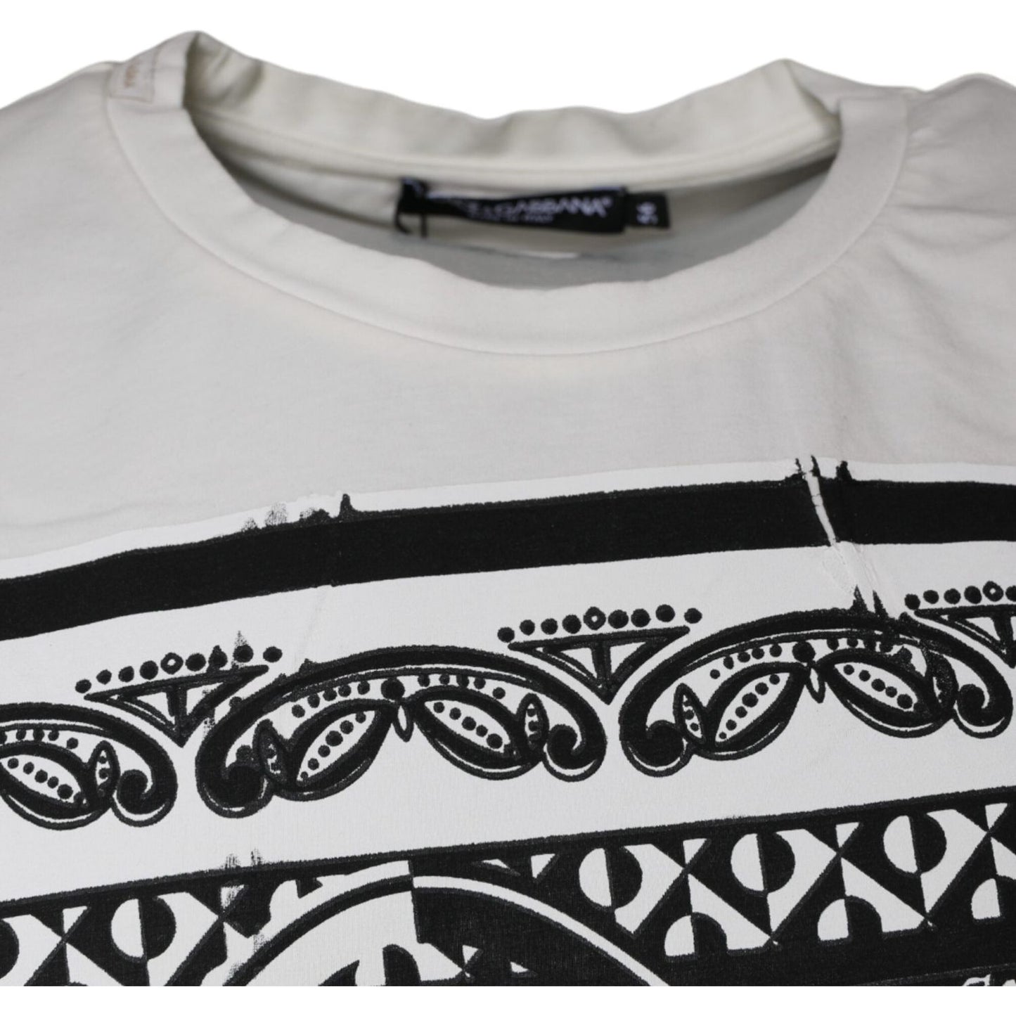 Dolce & Gabbana shirt with black bandana print on white cotton, minor defects visible.