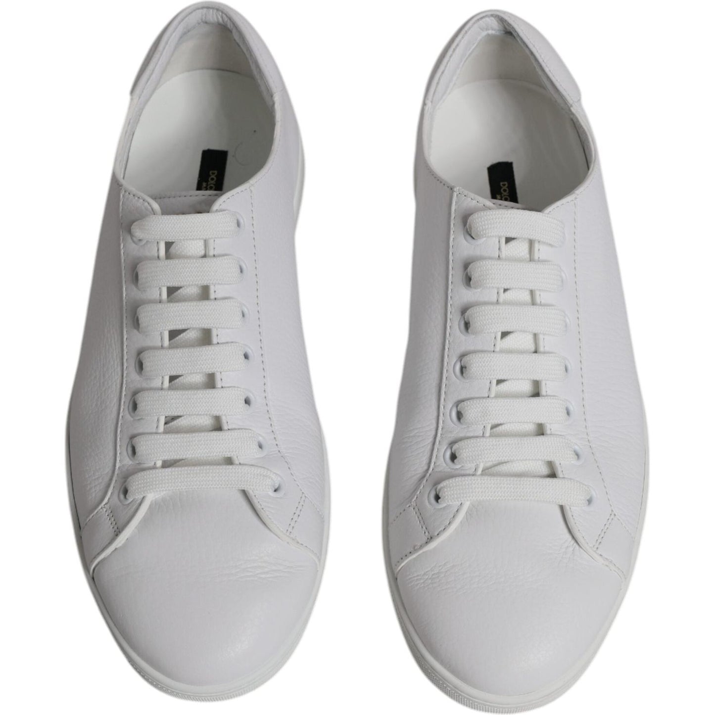 Dolce & Gabbana Saint Tropez white low top men's sneakers, leather material with lace-up closure, rubber sole, embossed logo detail.