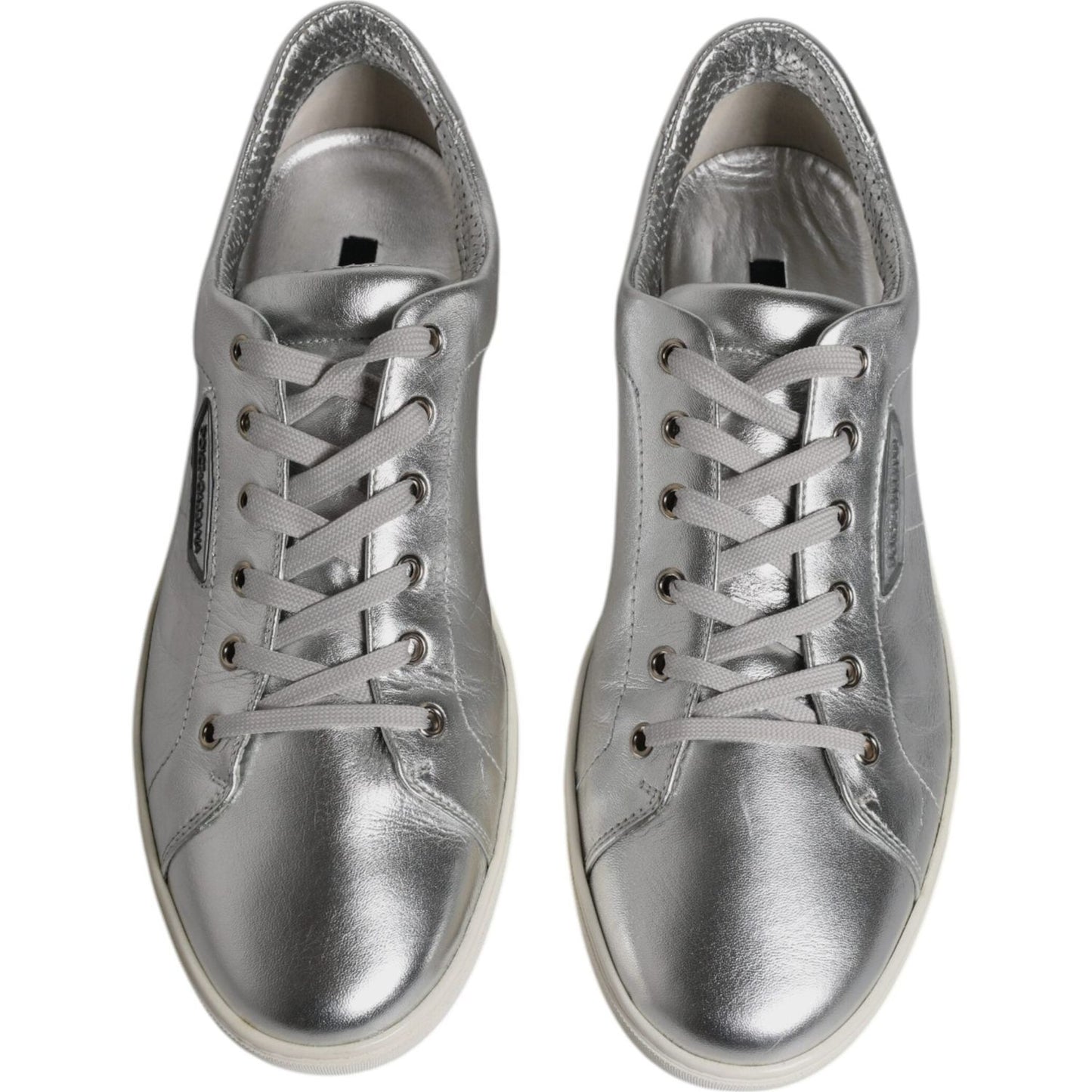 Dolce & Gabbana men's silver leather low top London sneakers, featuring lace-up closure and rubber sole, made in Italy.