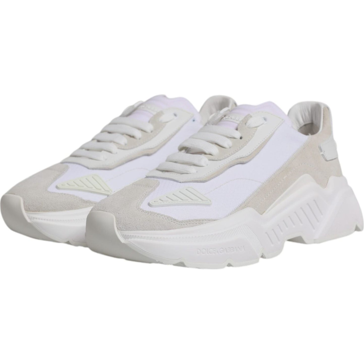 Dolce & Gabbana Daymaster low-top sneakers in white calf leather, nylon, and PVC with pen marks on right shoe, rubber sole, lace-up closure.