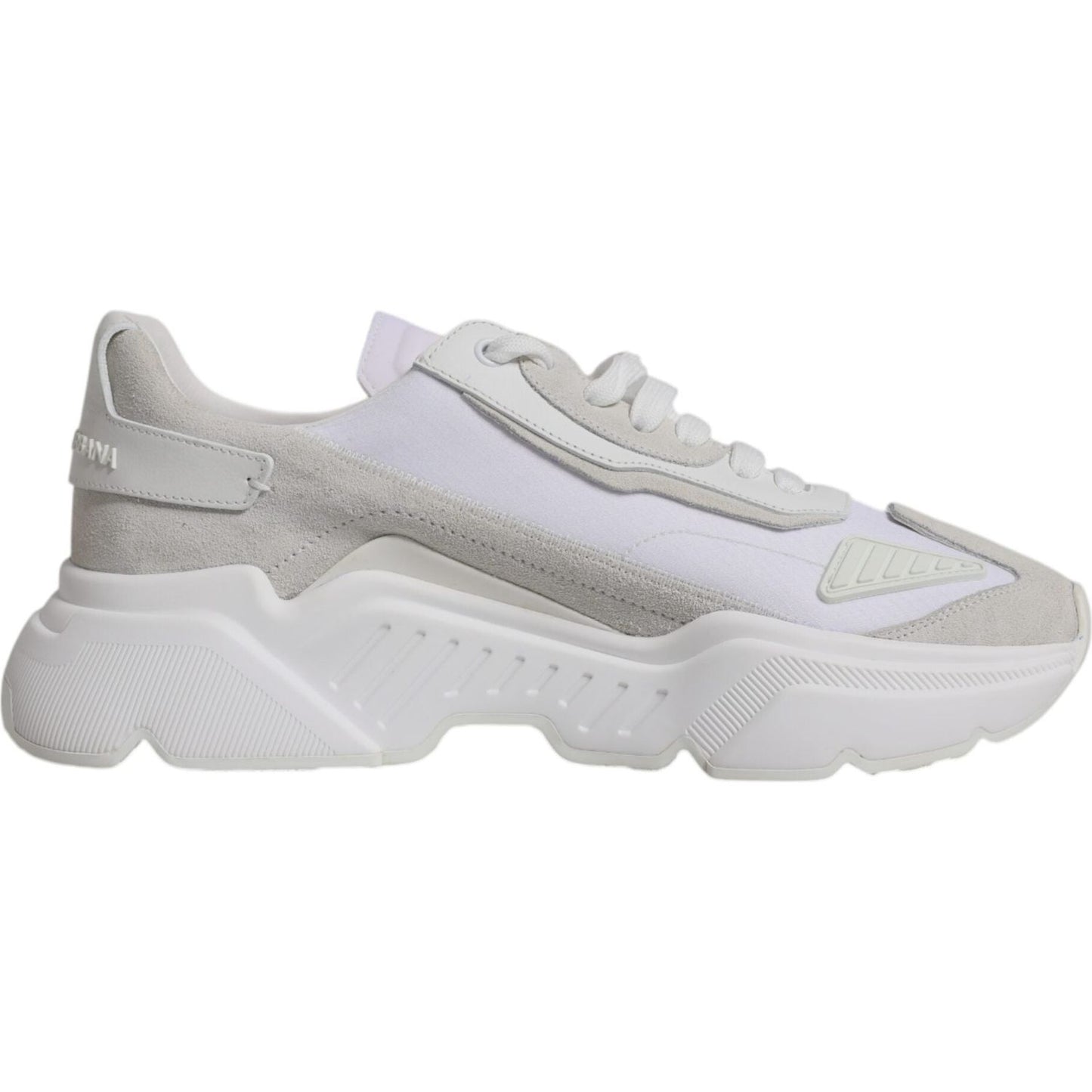 Dolce & Gabbana white leather Daymaster low top sneaker with rubber sole and lace-up closure, featuring logo details, side view.