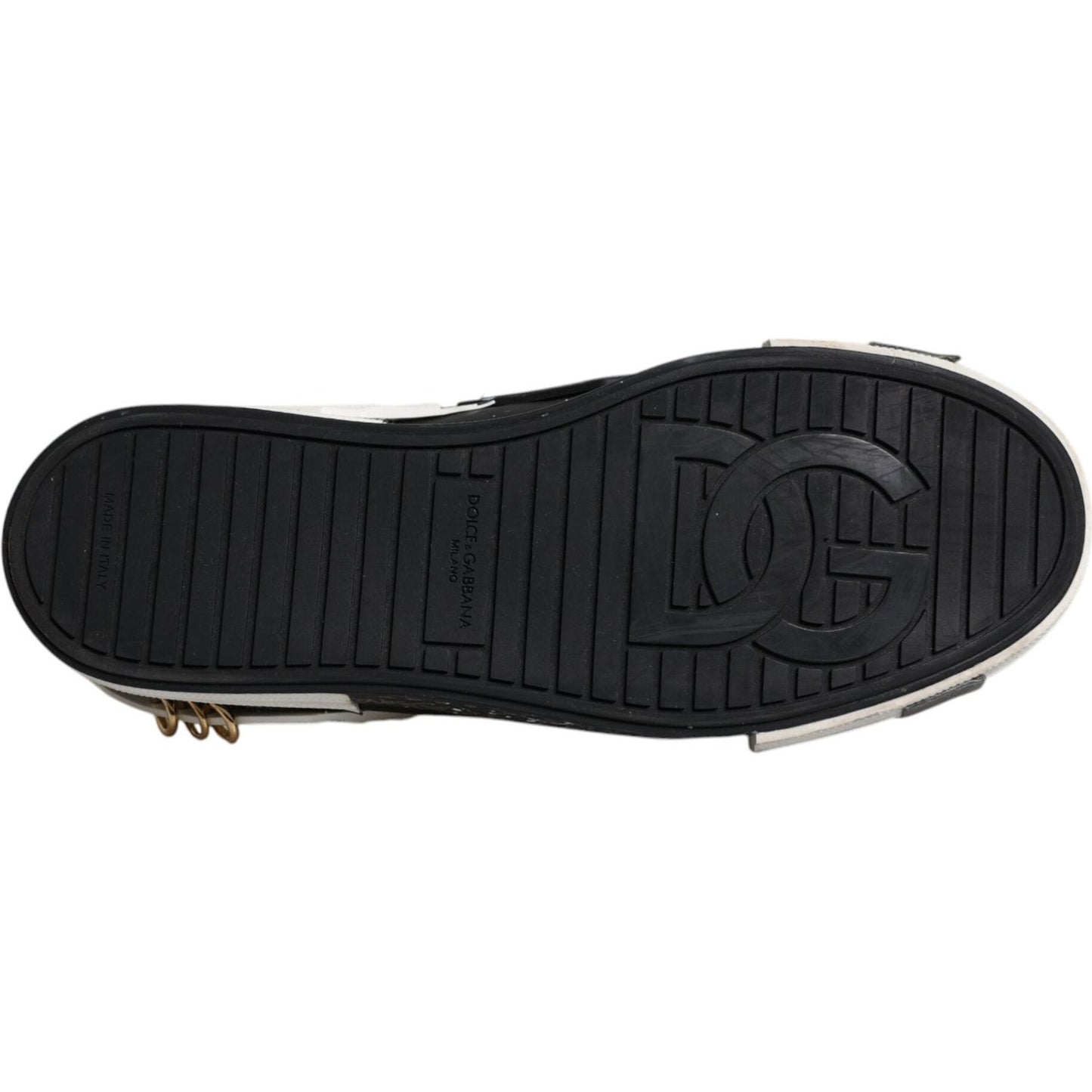 Sole view of Dolce & Gabbana black and white Portofino sneakers showing logo embossing and rubber material.