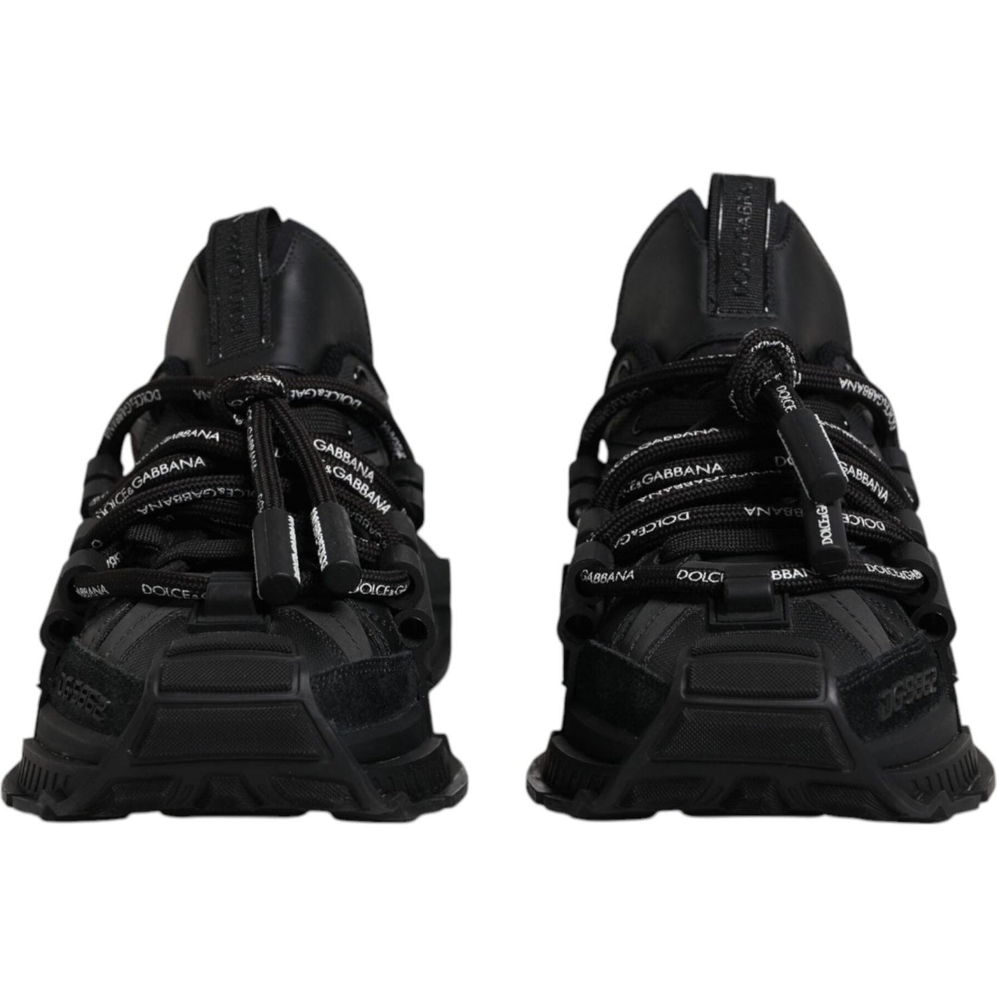 Dolce & Gabbana black low-top space lace-up sneakers, showing front view with brand logo detailing on laces and exclusive design.