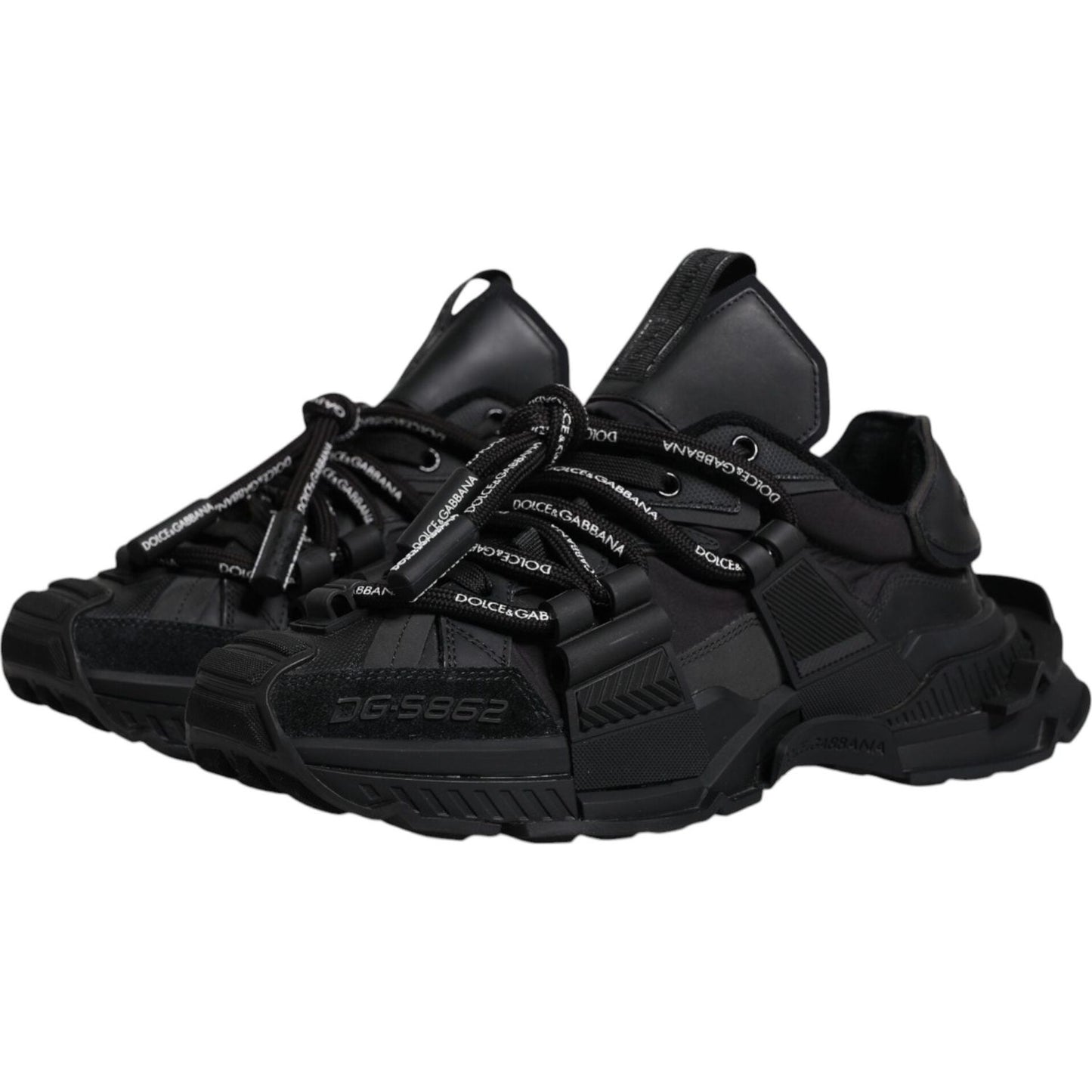 Dolce & Gabbana black low-top lace-up sneakers with logo details, rubber sole, and high craftsmanship. Made in Italy. Exclusive design.