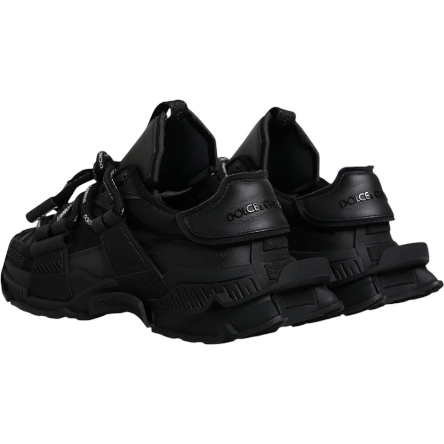 Dolce & Gabbana Black Low Top Space Lace Up Sneakers with rubber sole and logo details, showcasing elegant and modern design.