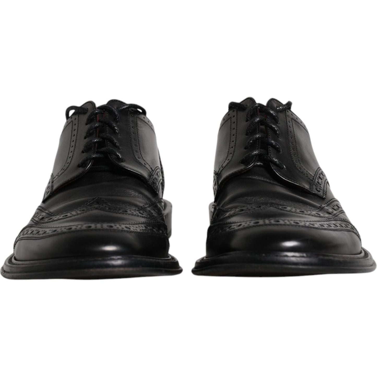 Dolce & Gabbana black leather derby wingtip formal shoes, preowned with lace-up closure, crafted in Italy from calfskin leather.
