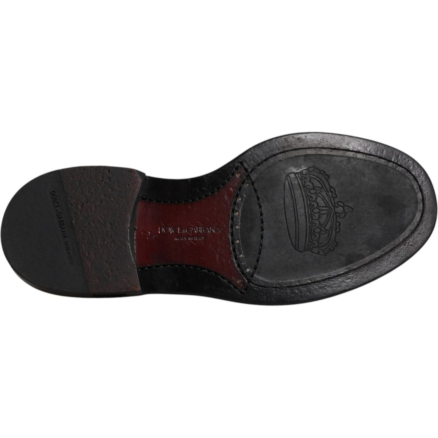 Sole of a Dolce & Gabbana black leather Derby wingtip shoe showcasing logo detail and craftsmanship.