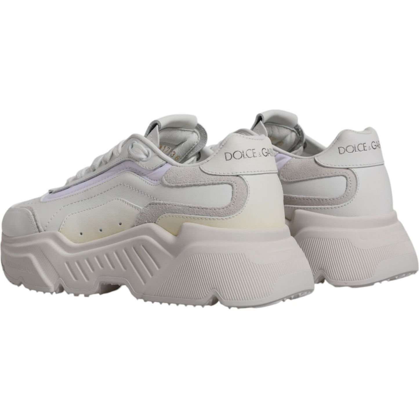Dolce & Gabbana White Daymaster Low Top Sneakers with minor discolorations, crafted from calf leather and nylon, featuring rubber soles and logo details.