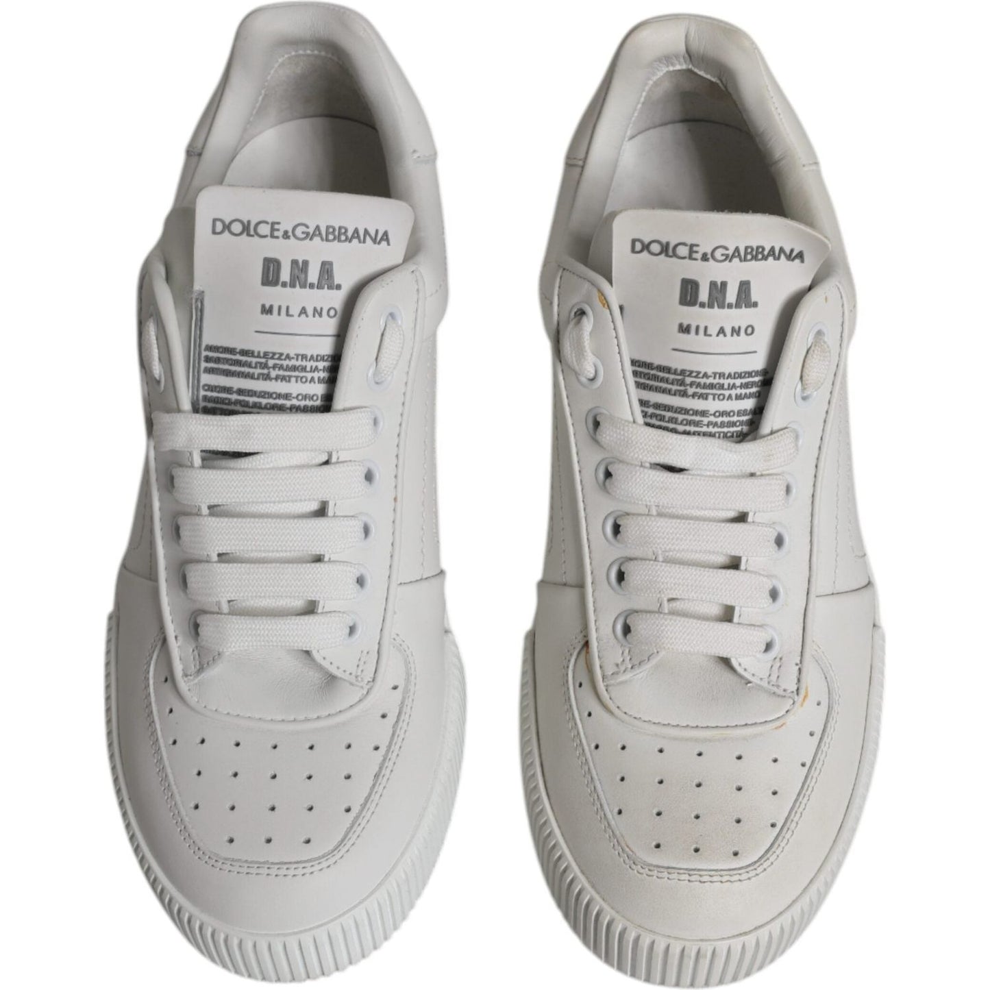 Dolce & Gabbana white Miami leather low top sneakers with logo, rubber sole, lace-up closure, minor defects visible.