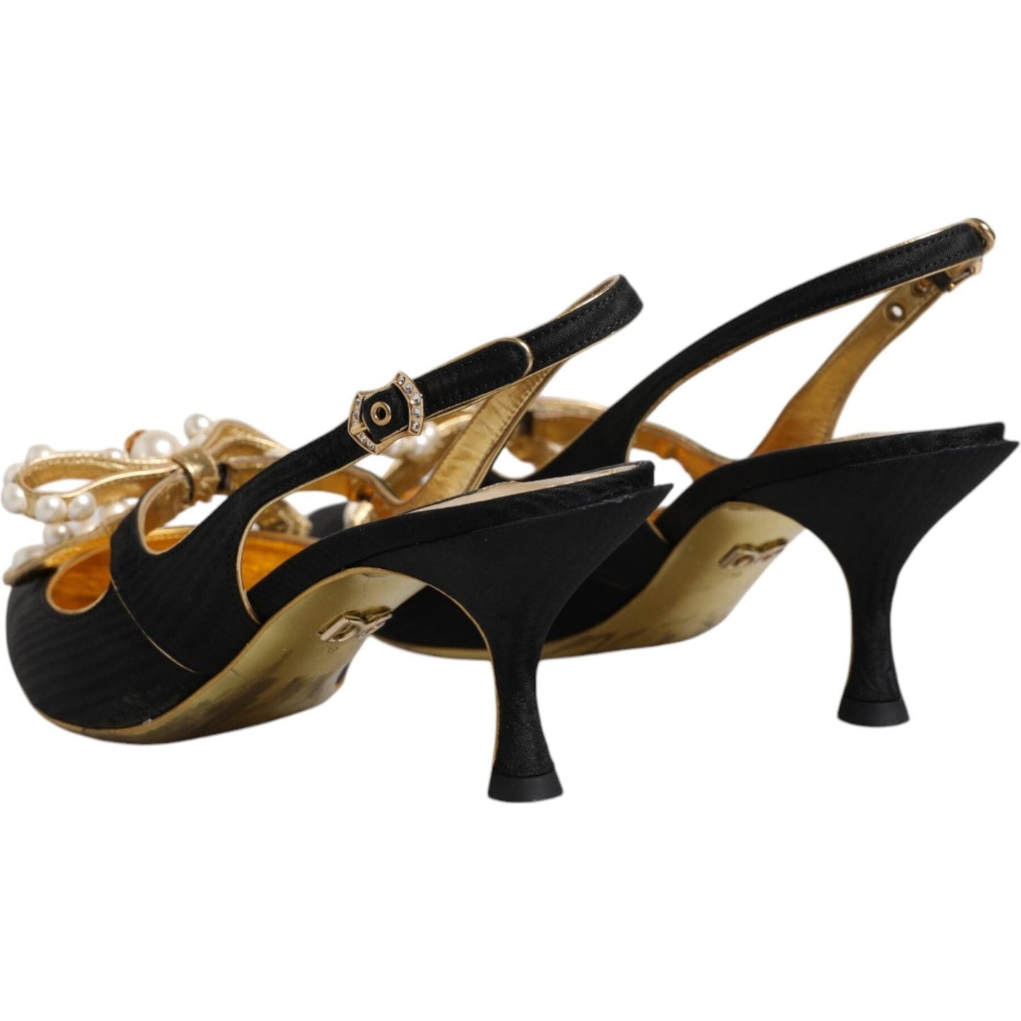 Dolce & Gabbana black leather slingback heels with faux pearls, gold accents, and a broken buckle on the right shoe. High-quality Italian design.