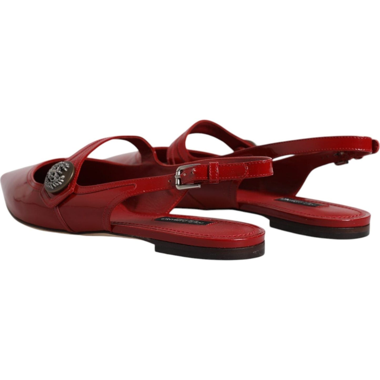 Dolce & Gabbana red leather slingback flats with buckle closure, logo details, and leather soles, made in Italy. Store sample with minor marks.