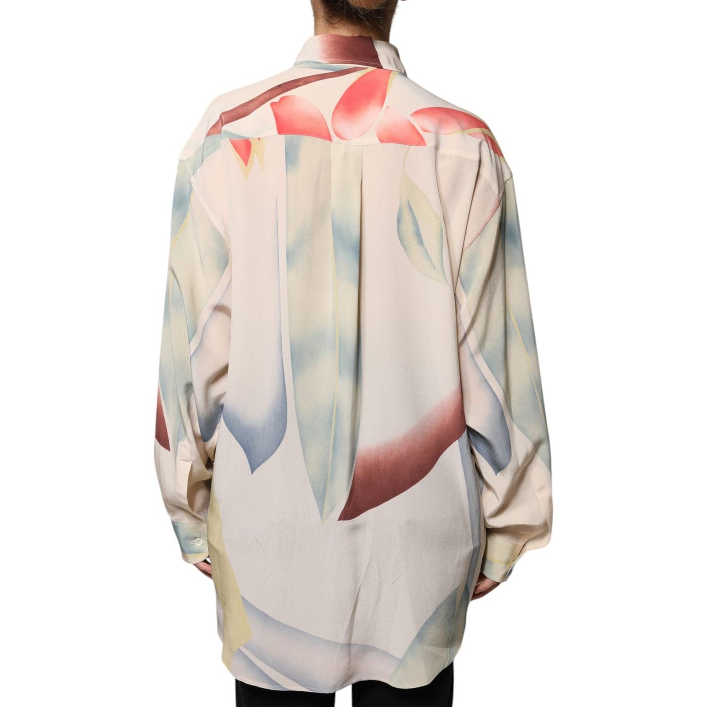 Back view of Etro beige printed silk blouse with long sleeves and buttoned closure, featuring colorful abstract pattern.