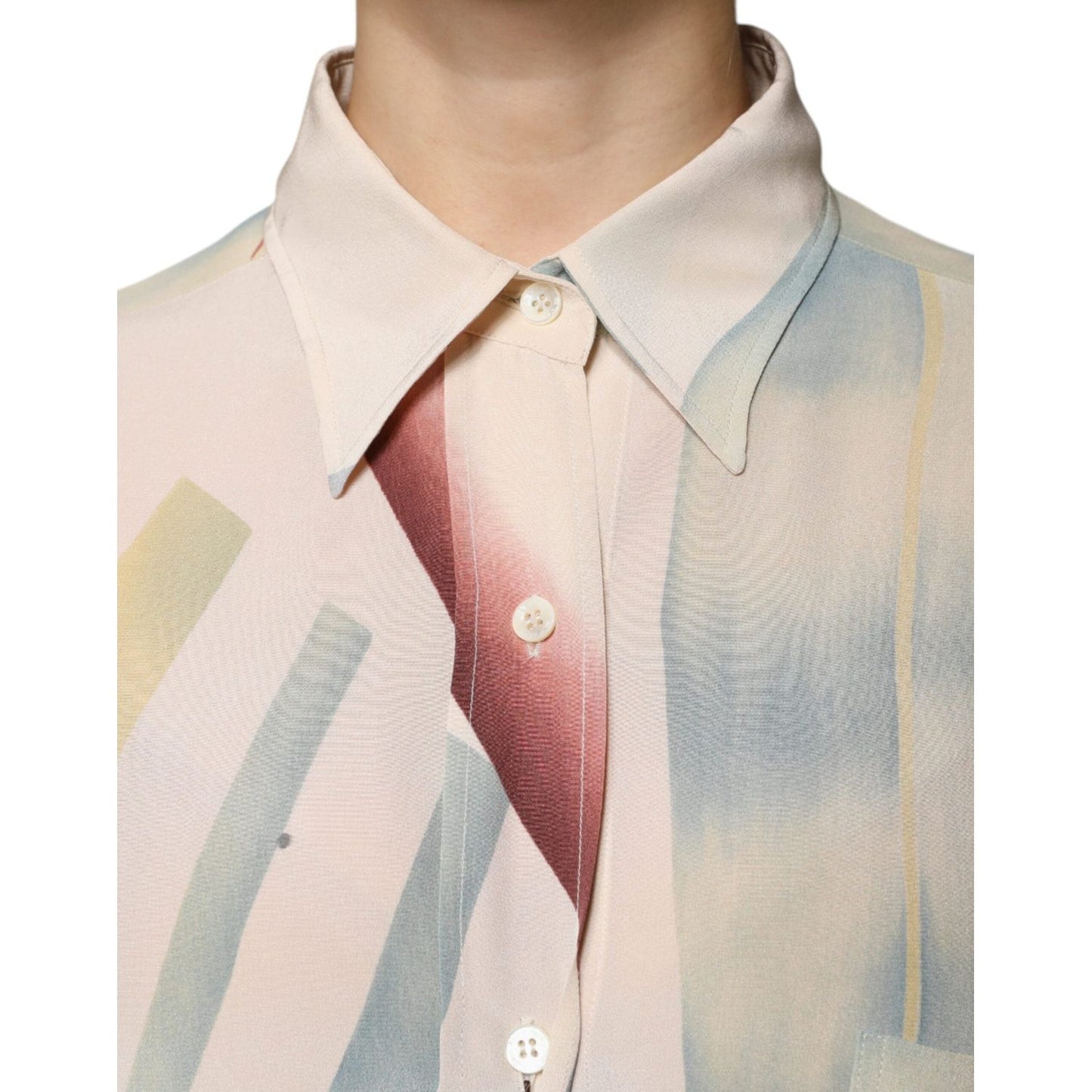 Etro beige printed collared buttoned silk blouse with long sleeves, features logo and minor front stains, made in Italy.