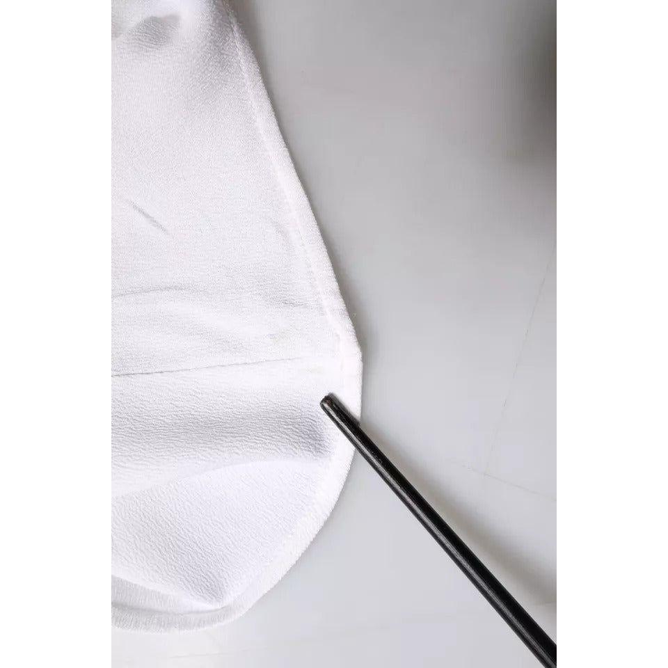 Fabiana Filippi white tank top showing minor defect with stain on fabric, close-up view.
