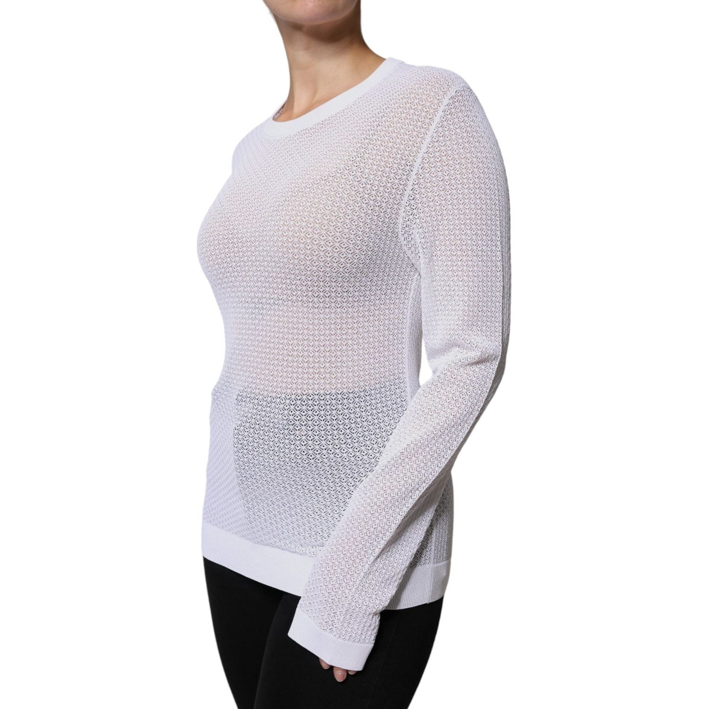Dolce & Gabbana white mesh see-through long sleeves top with minor neckline marks, 96% viscose, logo details, model shown wearing black pants.