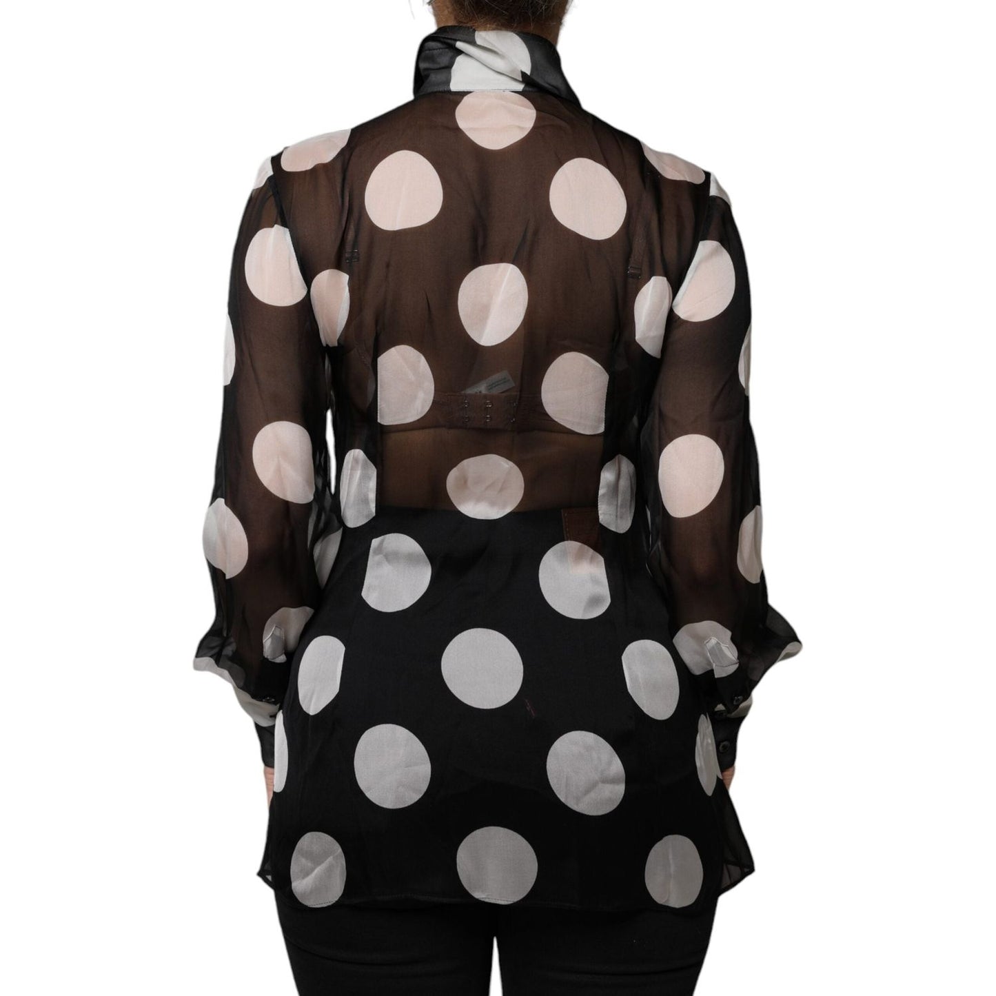 Dolce & Gabbana black white polka dot silk blouse with long sleeves, button front, and minor collar defect, back view