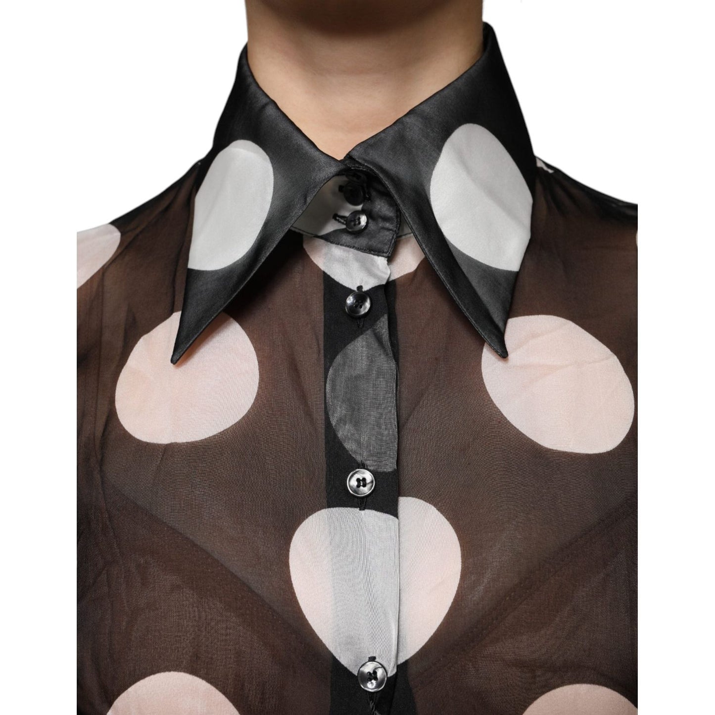 Dolce & Gabbana black and white polka dot silk blouse with long sleeves and button closure, showcasing collar details.