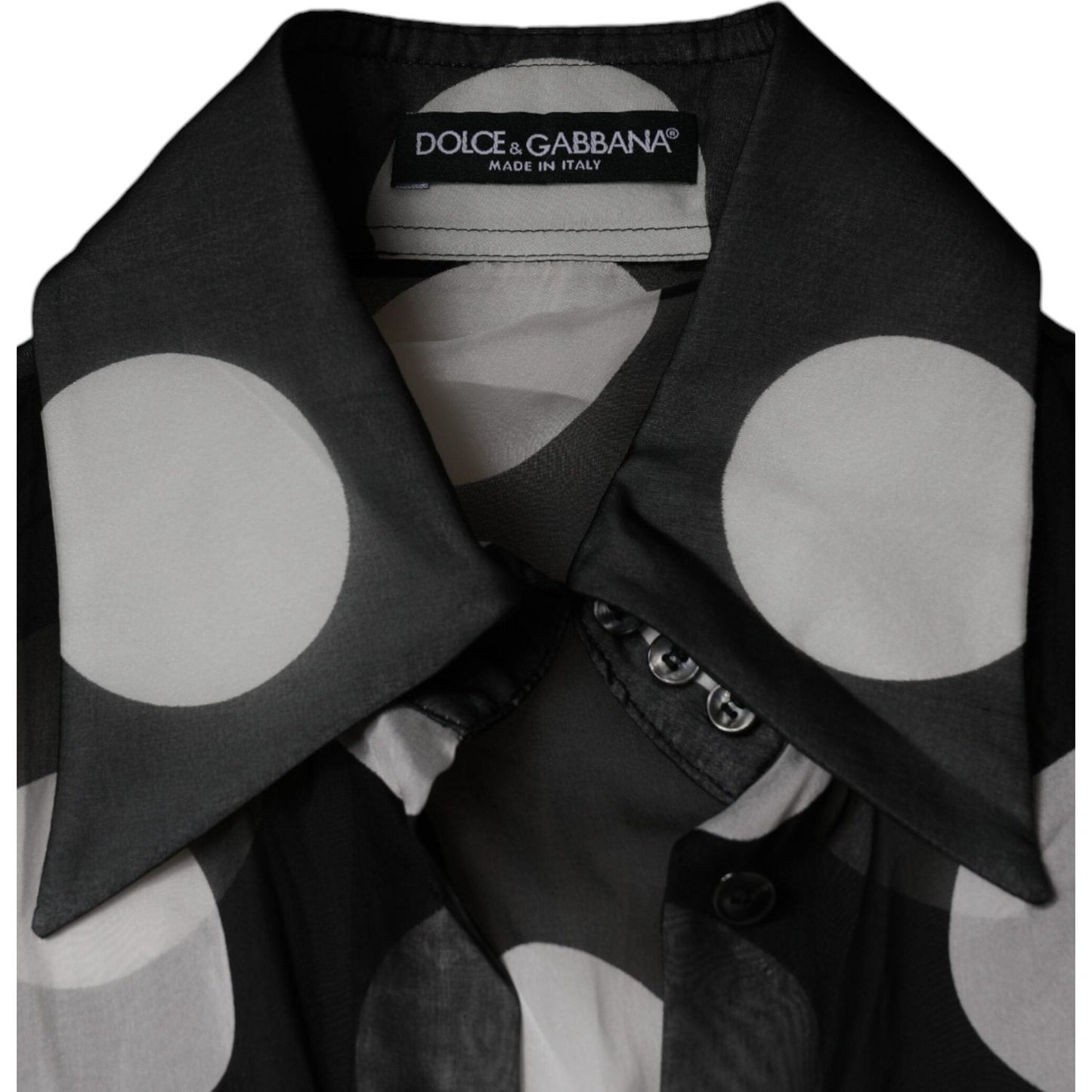 Dolce & Gabbana black and white polka dot silk blouse with collar and button front, made in Italy, showing logo tag.