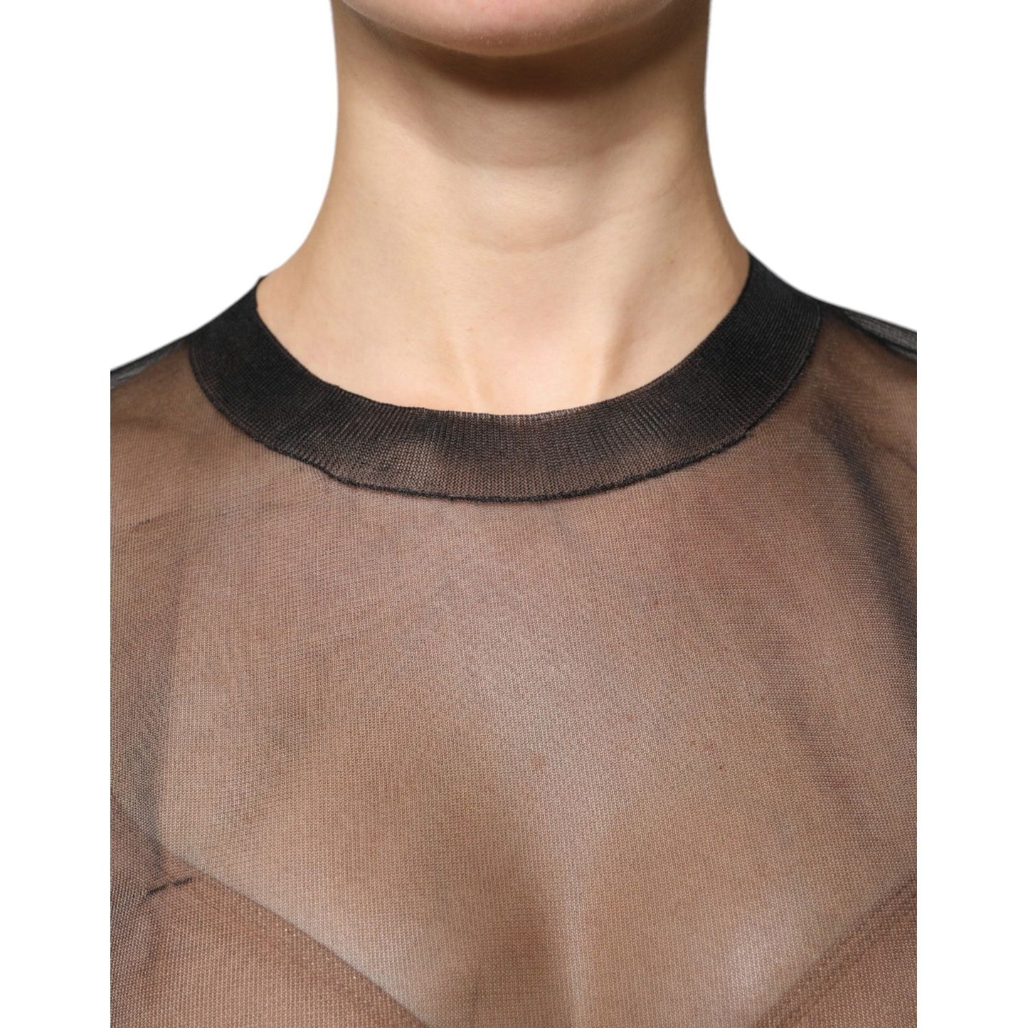 Dolce & Gabbana black sheer long sleeves crewneck blouse with minor defect, featuring exclusive Made in Italy craftsmanship.
