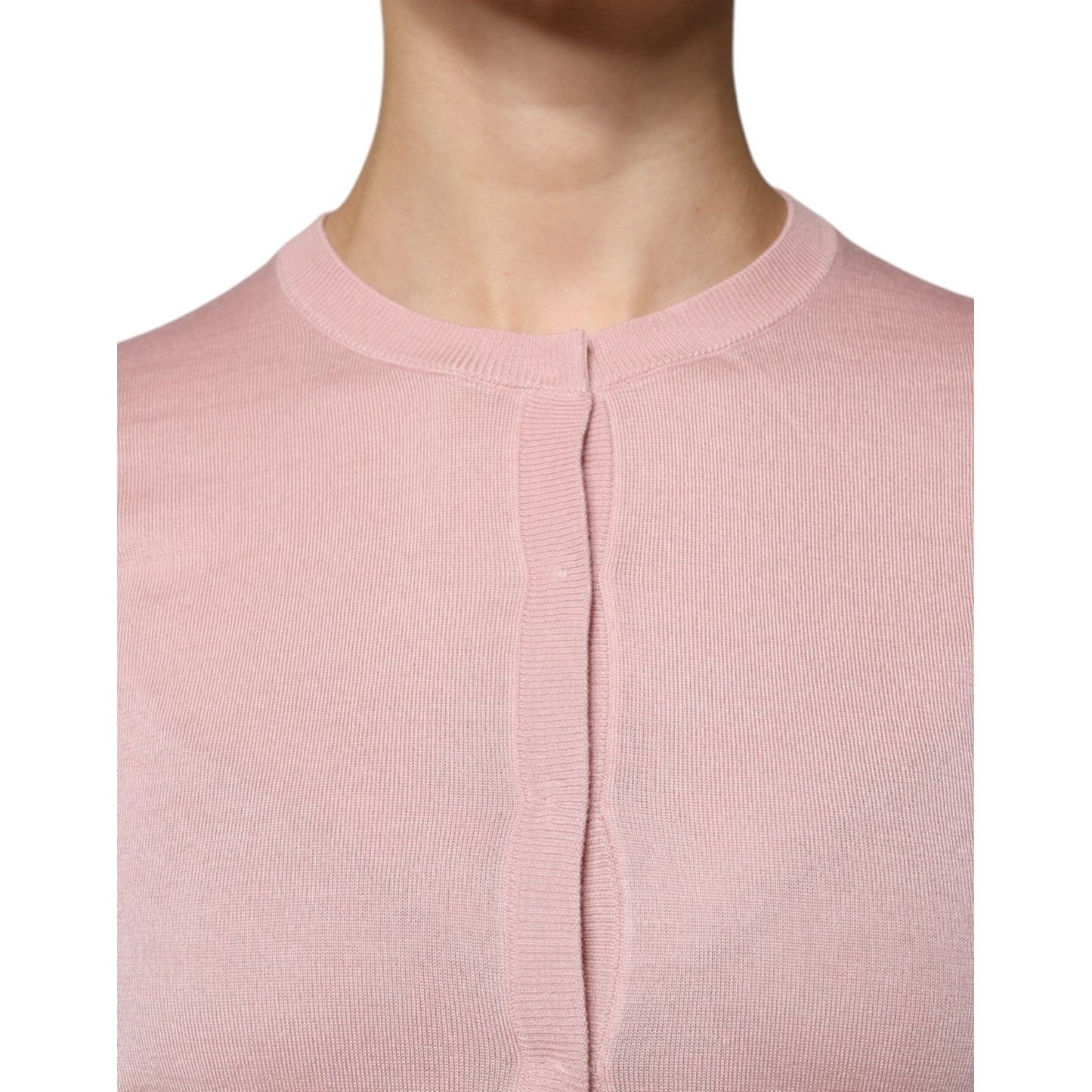 Dolce & Gabbana pink wool knit cardigan sweater with crew neck and button down, made in Italy, showcasing high craftsmanship.