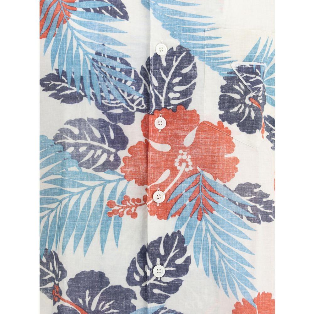 Prada Batista Ibiscus Shirt featuring a vibrant multicolor floral design with white buttons on a cotton fabric.
