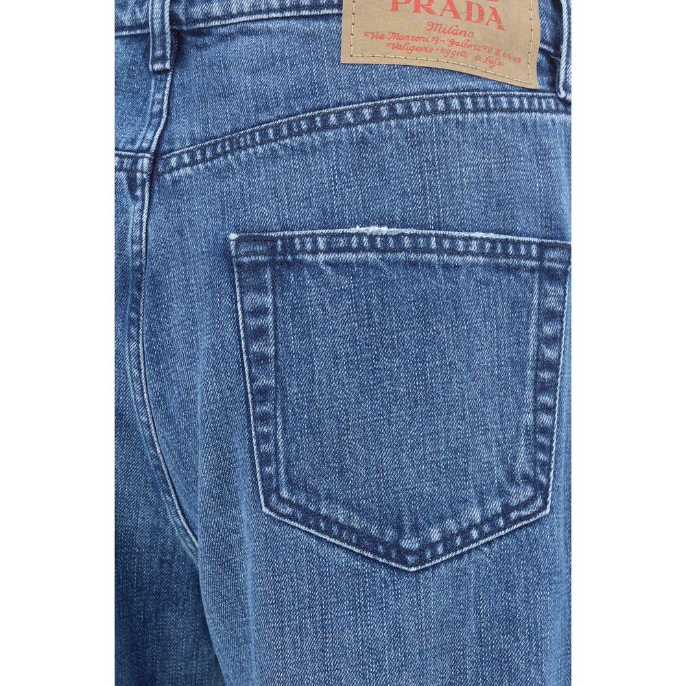 Prada cotton jeans with classic five-pocket design and signature leather patch detail, showcasing contemporary elegance and style.
