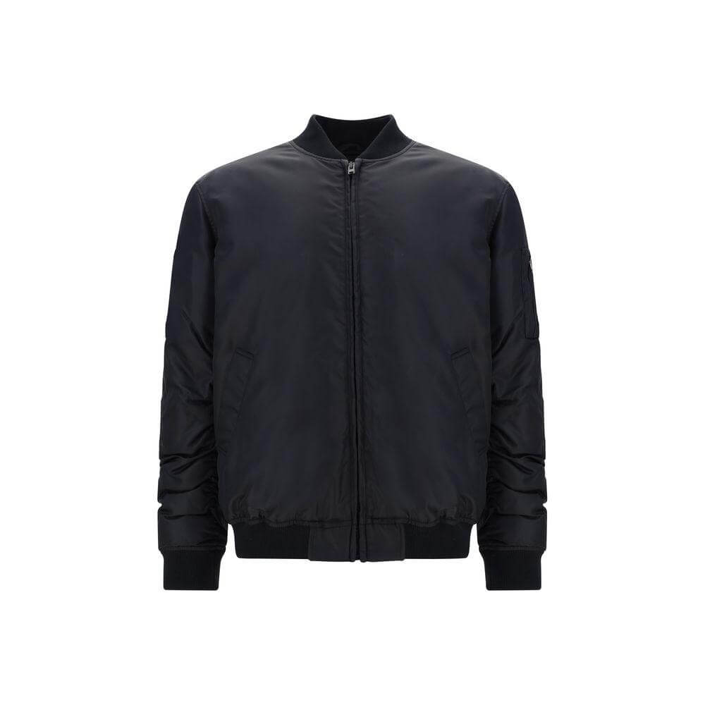 Moschino bomber jacket with front zipper, ribbed neck and cuffs, quilted design, zipper pocket on sleeve, contrasting print on back.