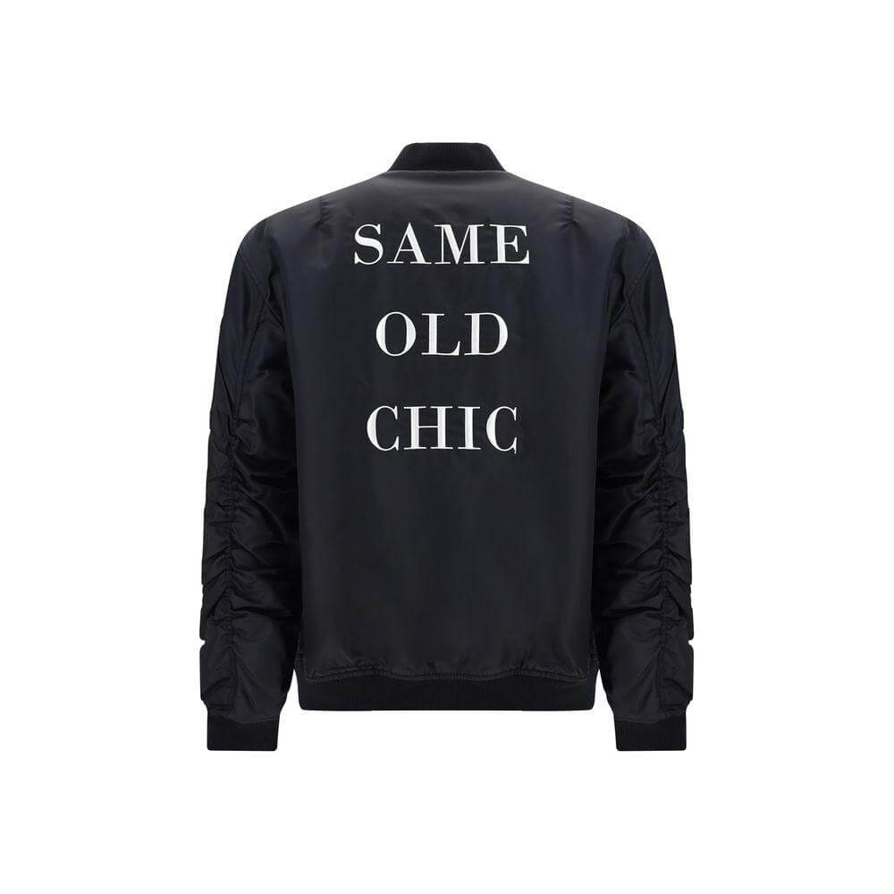 Back view of Moschino bomber jacket with "SAME OLD CHIC" print, quilted design, ribbed hem and cuffs.
